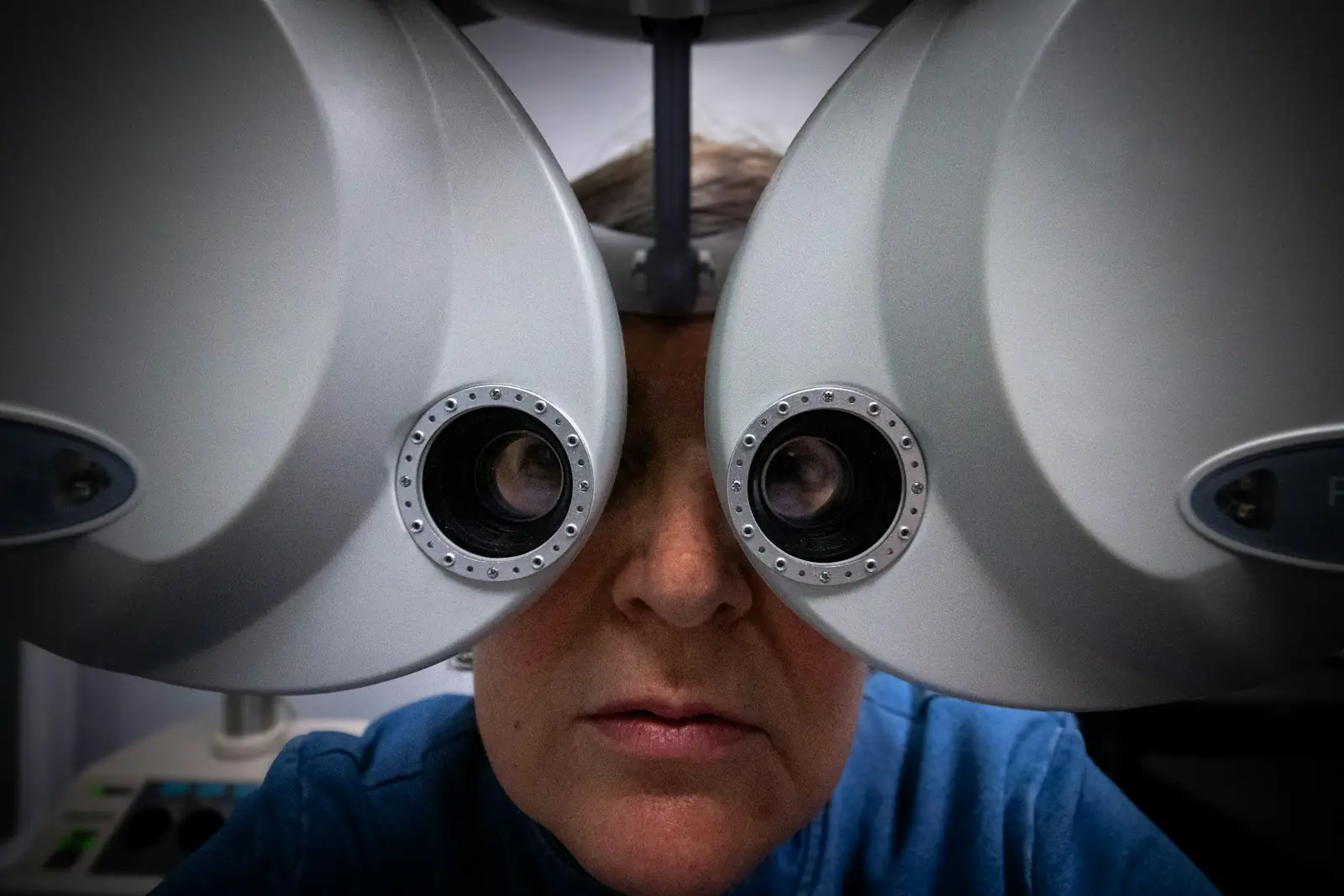 A patient at an eye examination machine